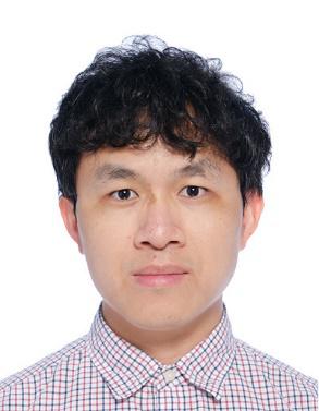 A person with black hair
Description automatically generated